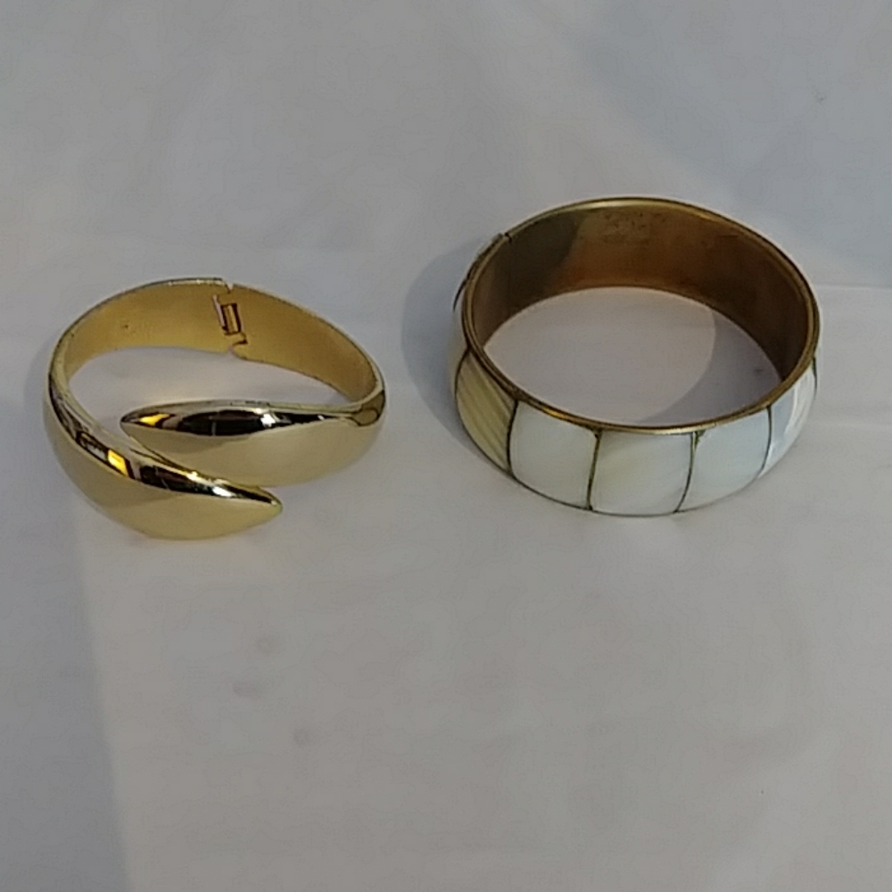 Gold and white Bracelets
